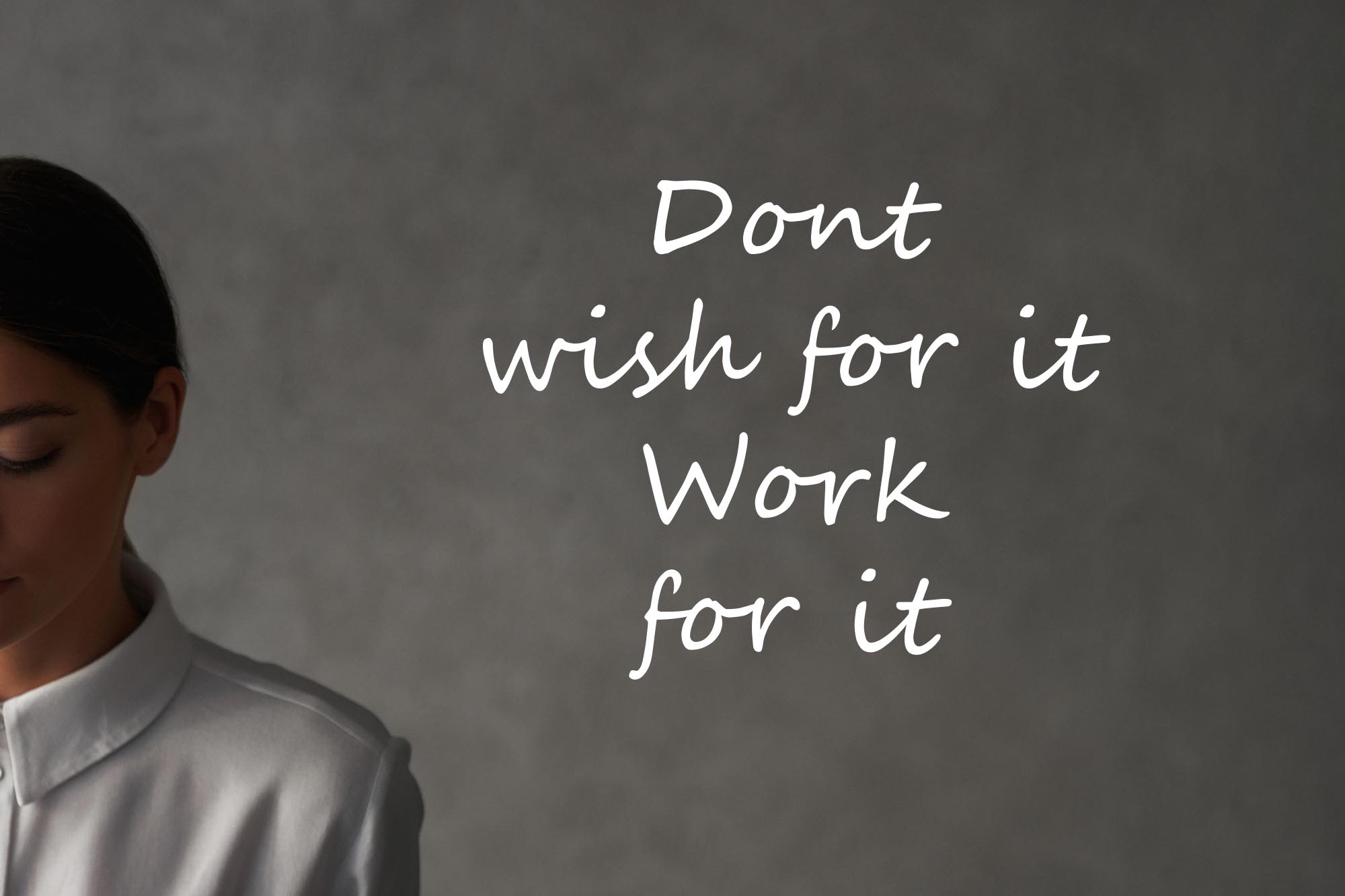 Woman sitting at table with laptop and writing notes Dont wish for it work for it